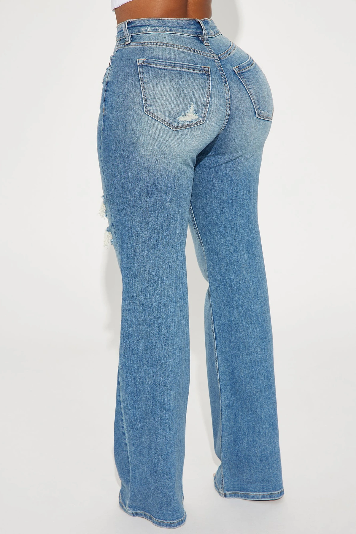 Remi Ripped Stretch Baggy Jeans - Medium Wash — Ganga de lavagem média